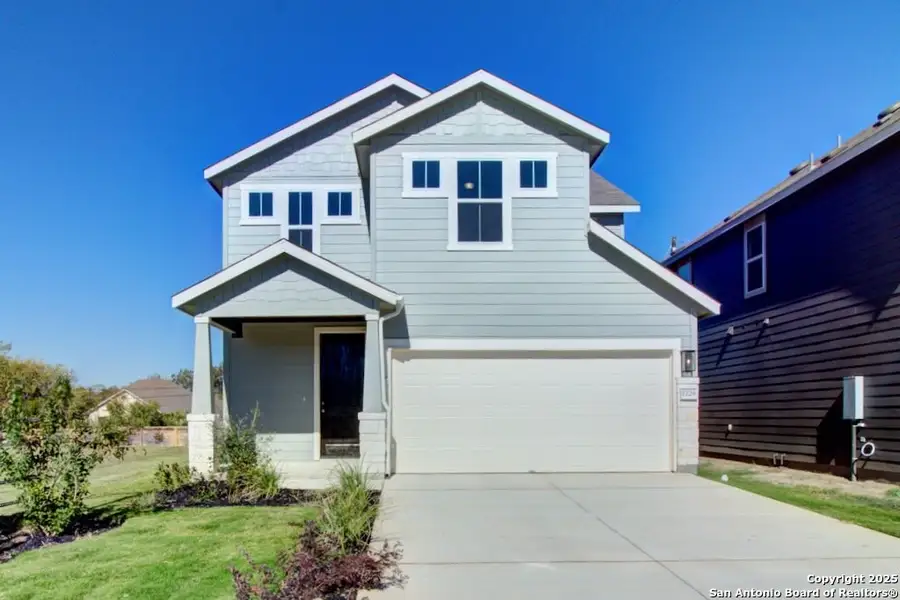 Front exterior of a new home in Casinas at Gruene, New Braunfels, TX, highlighting curb appeal (Image 1).