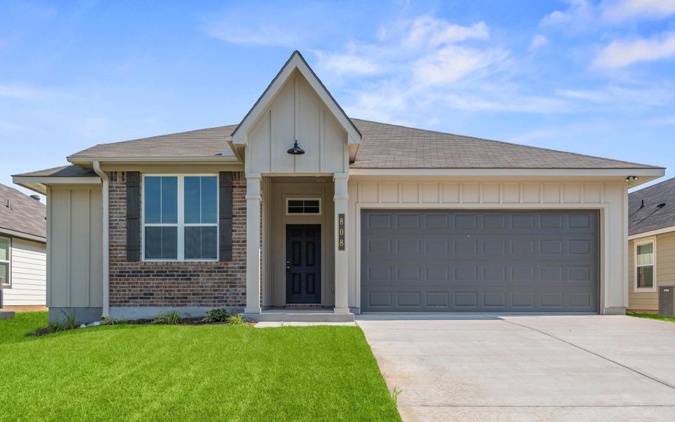 Front exterior of a new home in South Fork, Waco, TX, highlighting curb appeal (Image 1). Front exterior of a new home in South Fork, Waco, TX, highlighting curb appeal (Image 1).