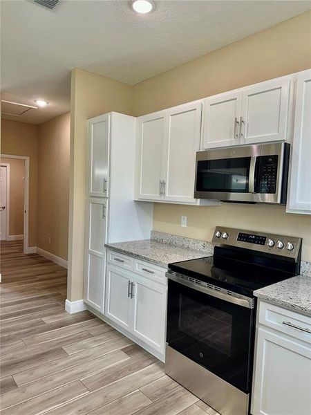 Furnished interior view inside a new home in , Weeki Wachee (Image 5).