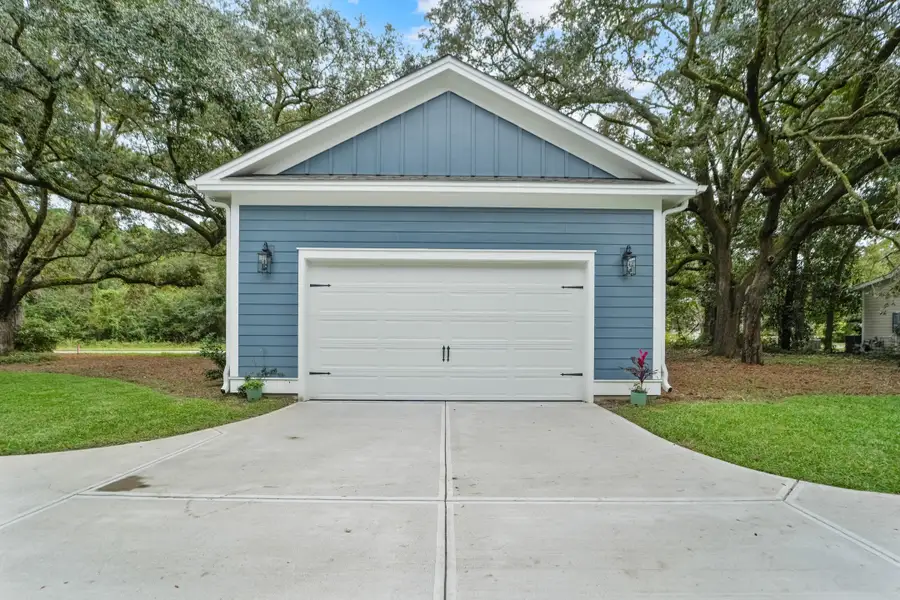Front exterior of a new home in , Johns Island, SC, highlighting curb appeal (Image 1).