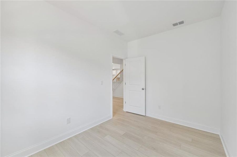 Spacious, unfurnished interior of a new home in Bailey Fence, Dacula (Image 66).
