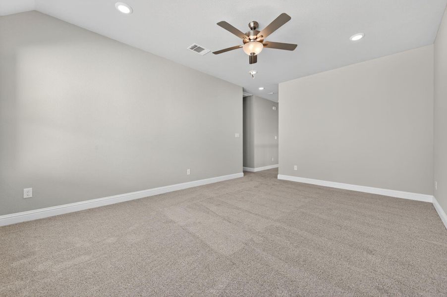 Unfurnished room featuring light carpet, recessed lighting, and ceiling fan