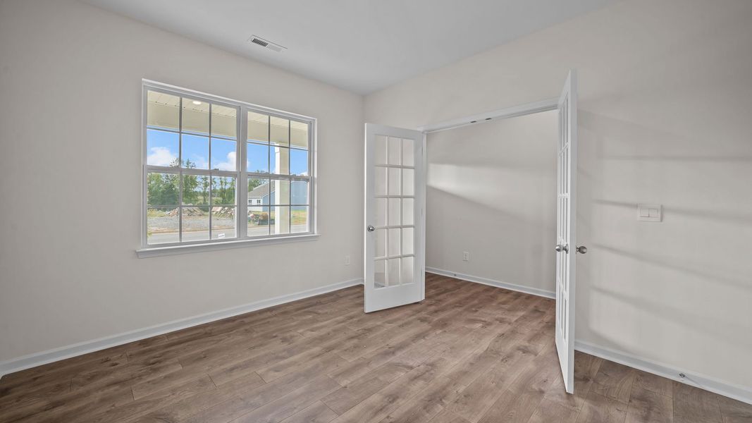 Representative furnished interior of a home built from the PENWELL by D.R. Horton in Bedford Place, Wilson (Image 13).