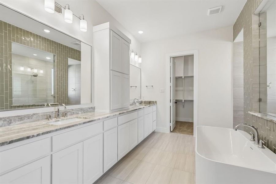 You'll find ample room for two in this gorgeous owner's bath! You'll find ample room for two in this gorgeous owner's bath!