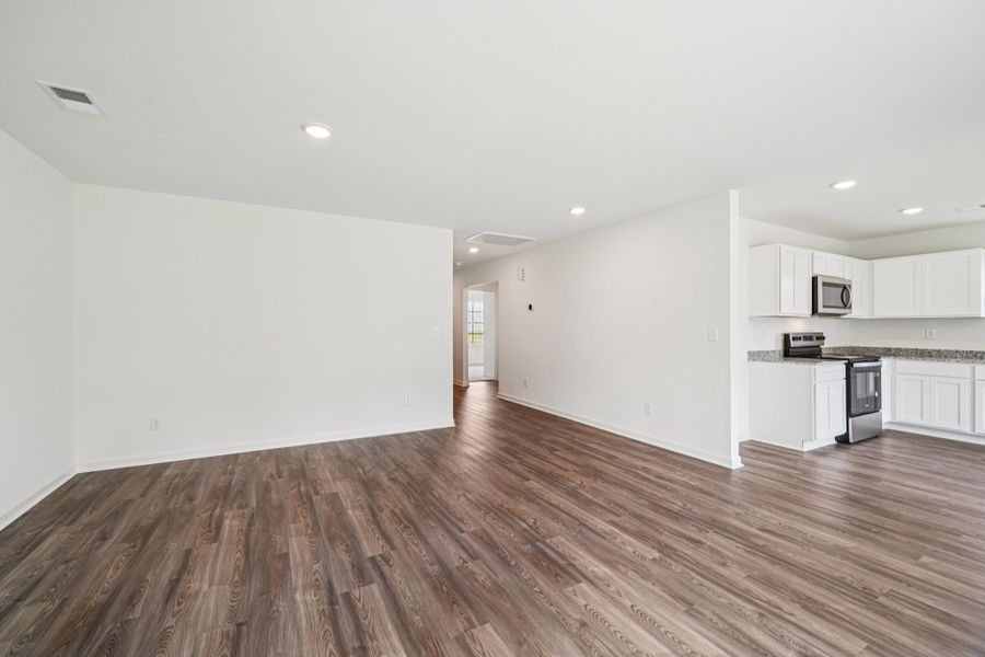 A large empty kitchen. A large empty kitchen.
