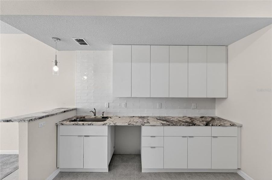 Furnished interior view inside a new home in , Davenport (Image 12).