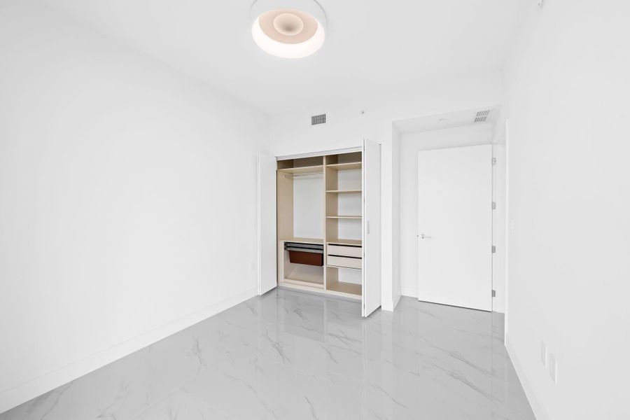 Spacious, unfurnished interior of a new home in Aria Reserve, Miami (Image 26). Spacious, unfurnished interior of a new home in Aria Reserve, Miami (Image 26).