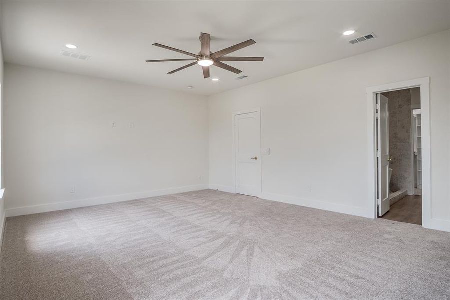 Unfurnished room featuring a ceiling fan, carpet flooring, and recessed lighting Unfurnished room featuring a ceiling fan, carpet flooring, and recessed lighting