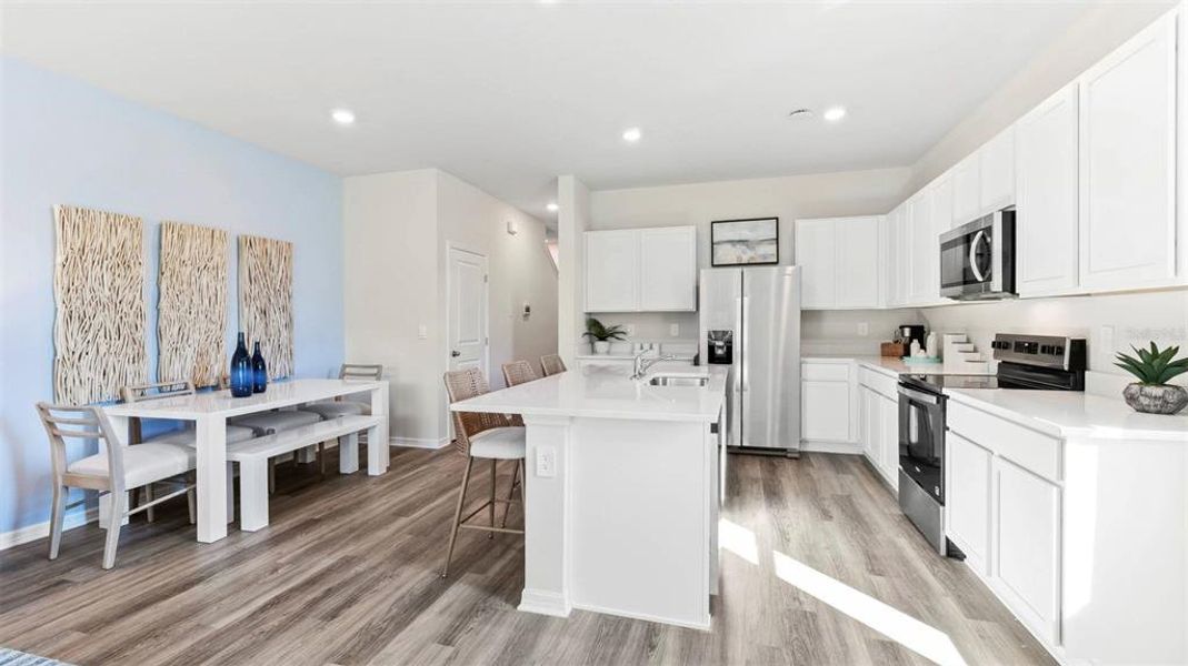 Furnished interior view inside a new home in Oasis at Longwood Run, Sarasota (Image 14).
