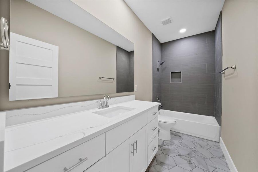 Furnished interior view inside a new home in , The Colony (Image 14).