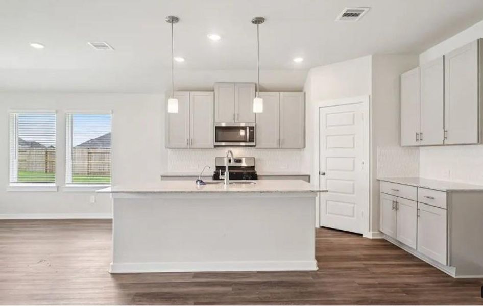 Photo is not of the actual home, but is an inspirational photo of builder’s model home and may depict options, furnishings, and/or decorator features that are not included