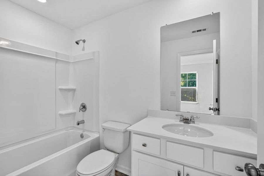 Furnished interior view inside a new home in Chandler Run, Tucker (Image 12).