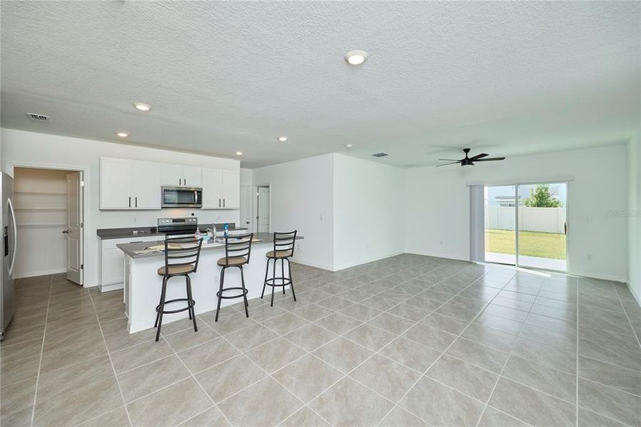 Furnished interior view inside a new home in Westgate at Avalon Park, Wesley Chapel (Image 8).