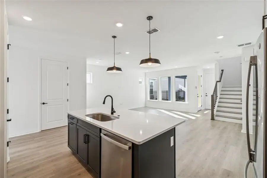 Furnished interior view inside a new home in Weslyn Park in Sunbridge 34', St. Cloud (Image 9).