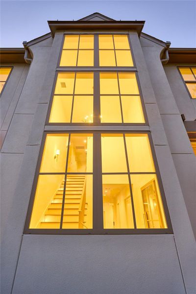 This home offers expansive windows that allow ample natural light. This home offers expansive windows that allow ample natural light.