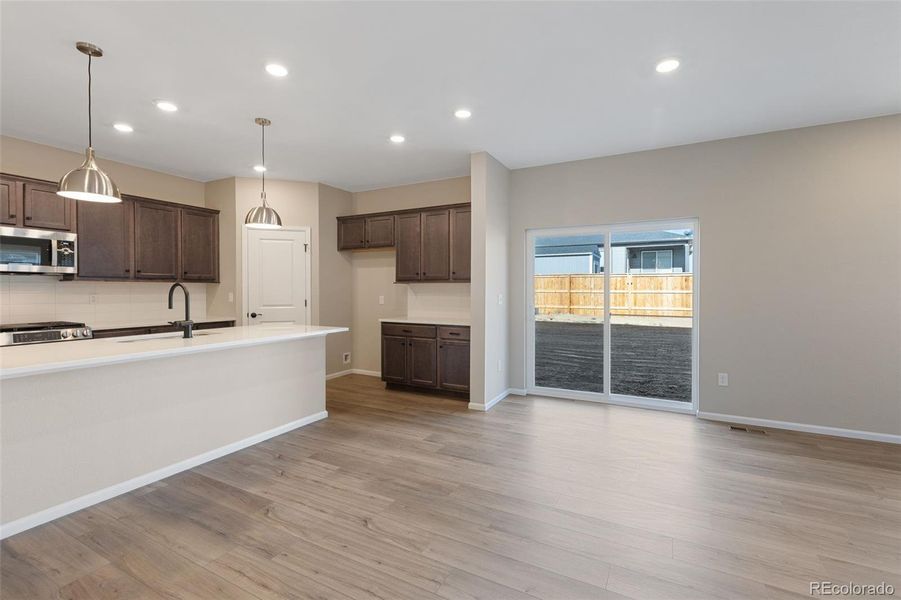 Furnished interior view inside a new home in The Cottages Collection at Ridgeline Vista, Brighton (Image 9).