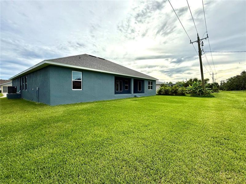 Front exterior of a new home in Rotonda, Rotonda West, FL, highlighting curb appeal (Image 1). Front exterior of a new home in Rotonda, Rotonda West, FL, highlighting curb appeal (Image 1).