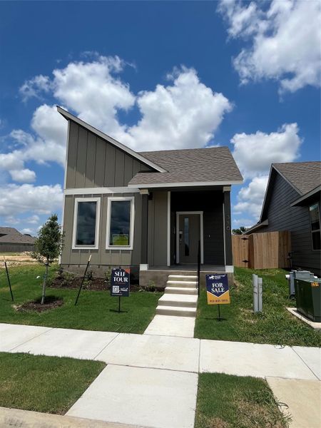 Front exterior of a new home in , San Marcos, TX, highlighting curb appeal (Image 1).