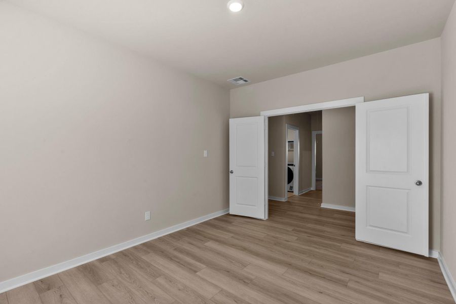 Spacious, unfurnished interior of a new home in Arabella on the Prairie 60', Richmond (Image 18).