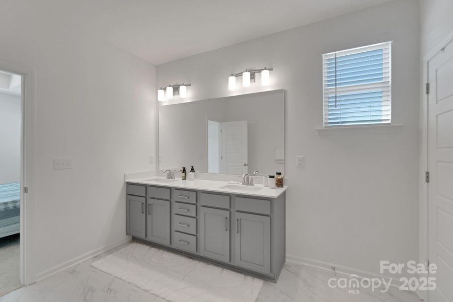 Furnished interior view inside a new home in The Hills, Huntersville (Image 10).