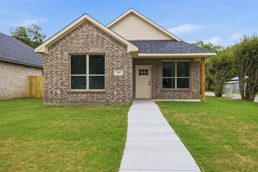 Front exterior of a new home in , Cleburne, TX, highlighting curb appeal (Image 1). Front exterior of a new home in , Cleburne, TX, highlighting curb appeal (Image 1).