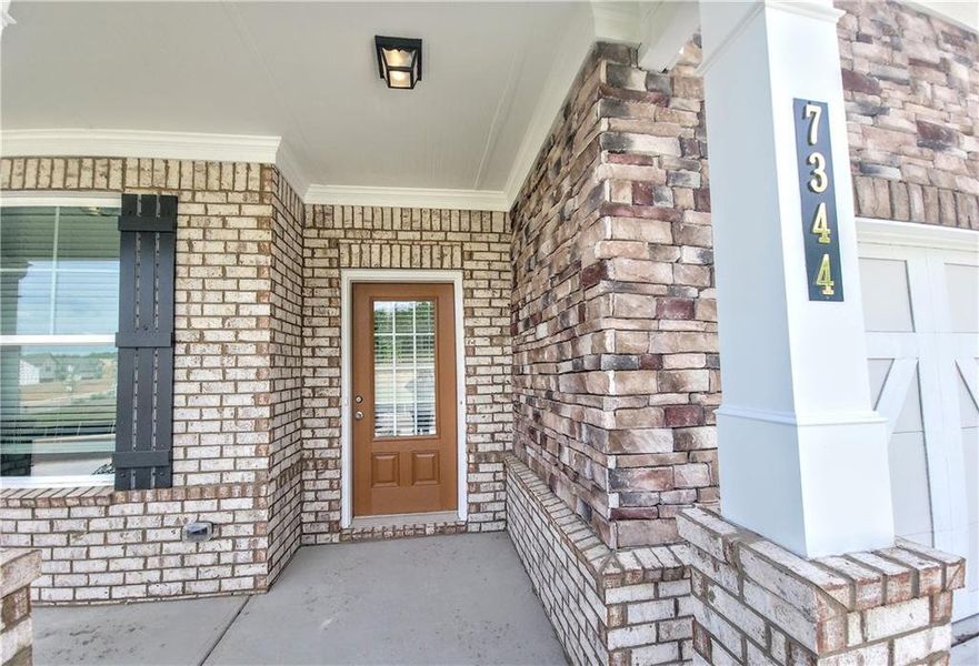 Exterior details and patio area of a home in Clark Farms, Flowery Branch (Image 3).