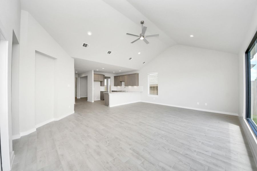 Take another glimpse into the heart of the home with this additional view of the family room—a sprawling space ready to accommodate all your gatherings. Take another glimpse into the heart of the home with this additional view of the family room—a sprawling space ready to accommodate all your gatherings.