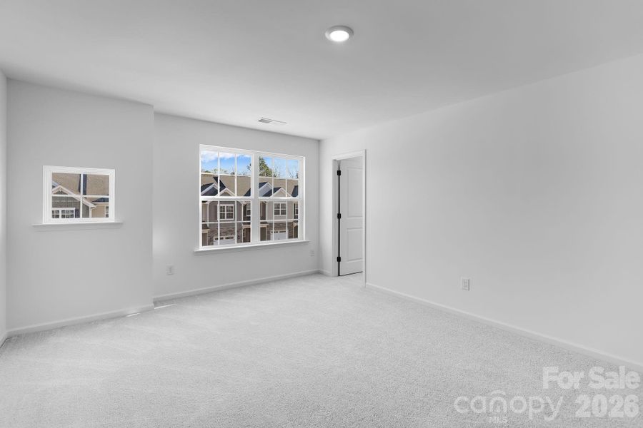 Spacious, unfurnished interior of a new home in Cannon Village, York (Image 13).