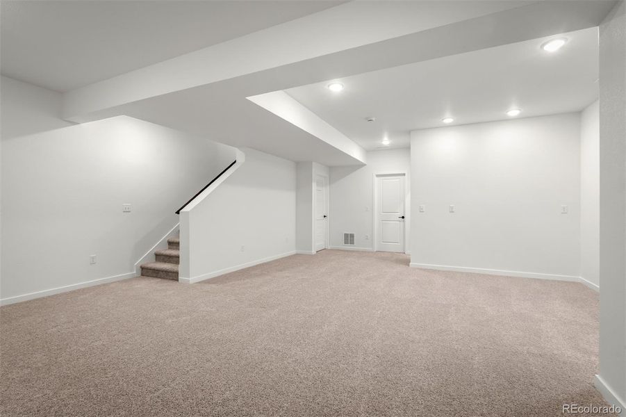Spacious, unfurnished interior of a new home in Revel Crossing at Wolf Ranch – The Outlook Collection, Colorado Springs (Image 31).