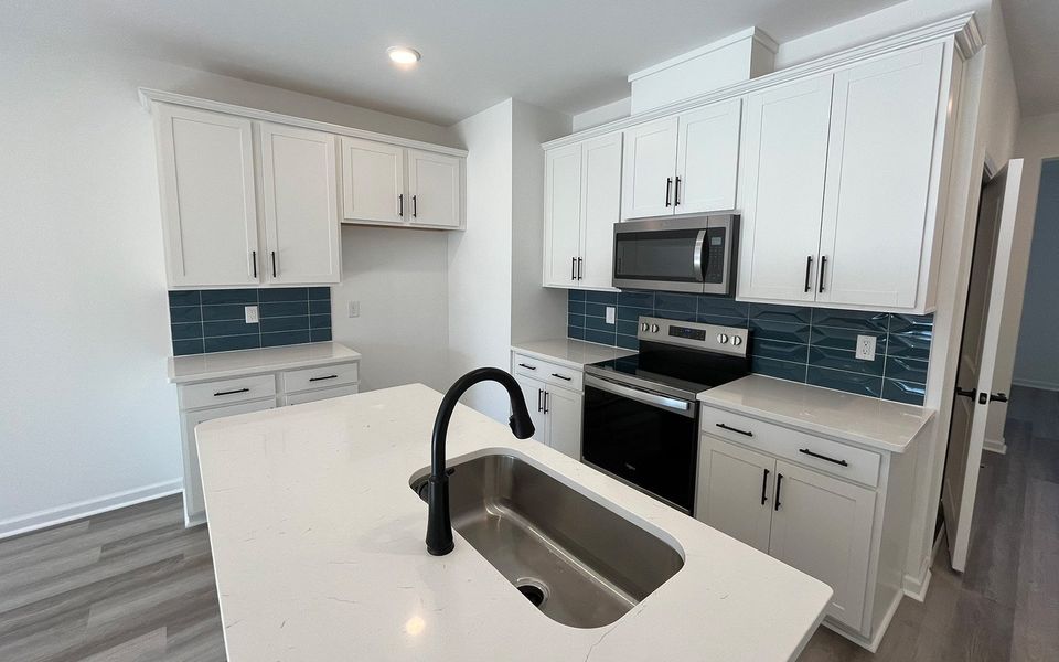 Furnished interior view inside a new home in Townhomes at Wendell Falls, Wendell (Image 6).