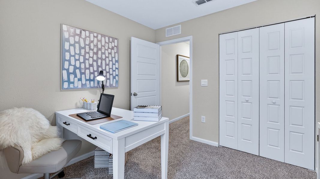 Representative furnished interior of a home built from the Greyson II by D.R. Horton in Irongate Villas, Jacksonville (Image 22).