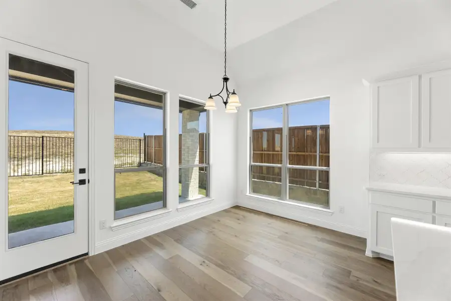 Representative unfurnished interior of a home built from the Newport by Windsor Homes in Nelson Lake Estates, Rockwall (Image 18).