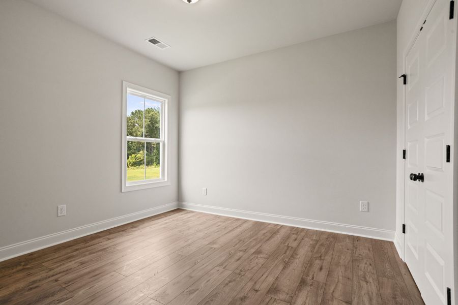 Spacious, unfurnished interior of a new home in Cherokee Knoll, Williamston (Image 25).