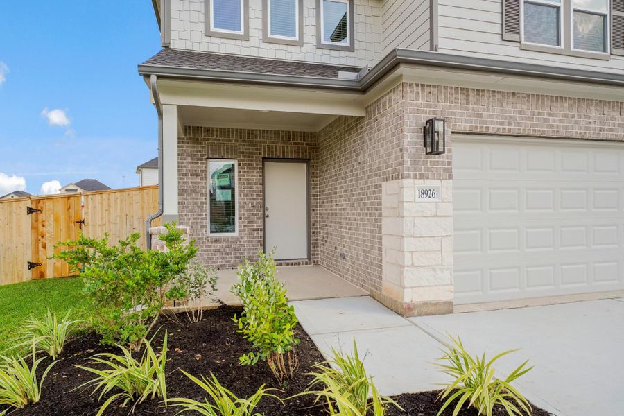 Exterior details and patio area of a home in Grand Oaks Village, Houston (Image 2). Exterior details and patio area of a home in Grand Oaks Village, Houston (Image 2).
