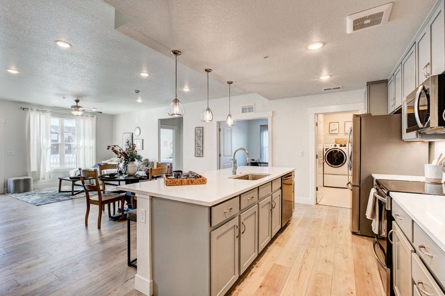 Representative furnished interior of a home built from the The Cambridge by Landmark Homes in The Lakes at Centerra, Loveland (Image 9).