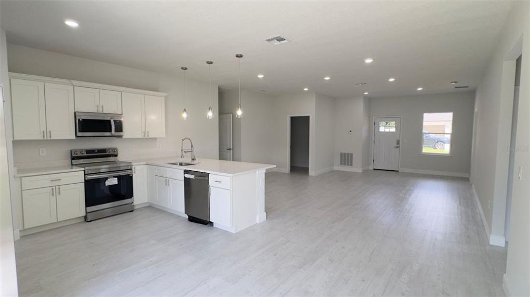 Furnished interior view inside a new home in , Ocala (Image 5). Furnished interior view inside a new home in , Ocala (Image 5).