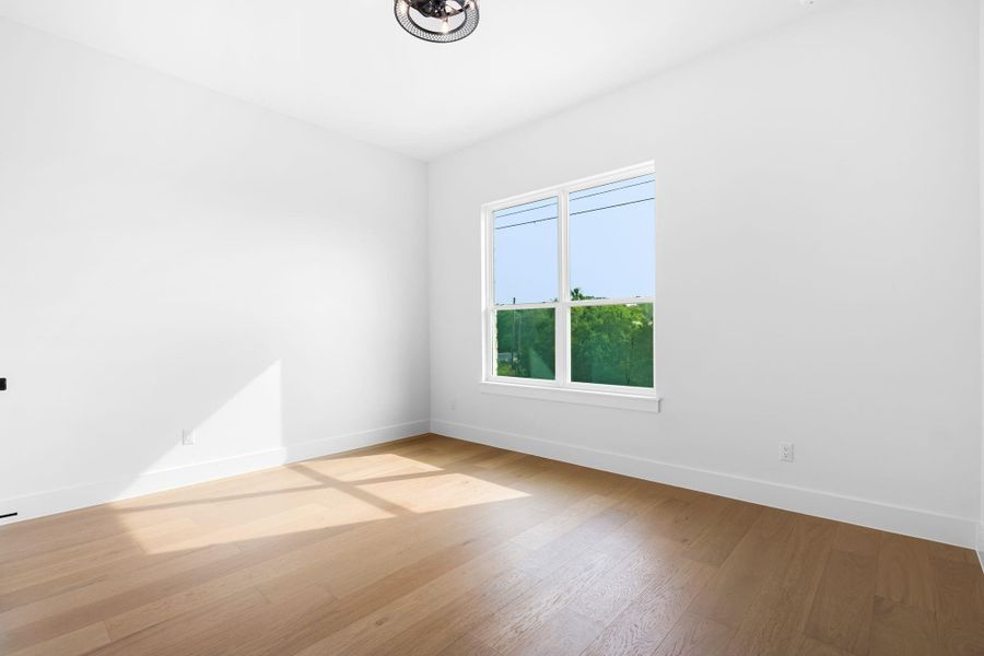 Spare room with light hardwood / wood-style flooring Spare room with light hardwood / wood-style flooring
