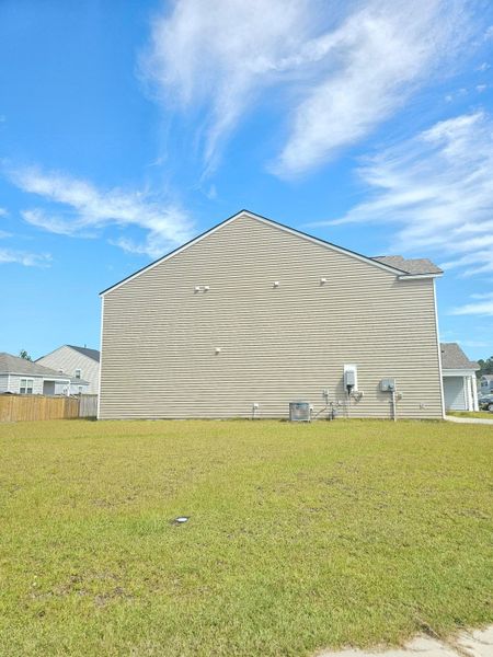 Front exterior of a new home in , Ladson, SC, highlighting curb appeal (Image 2).