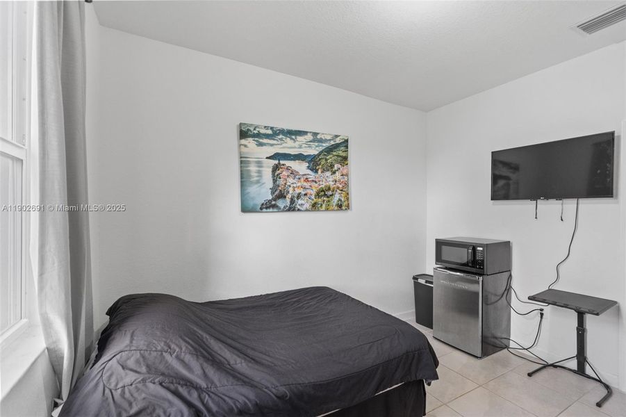 Furnished interior view inside a new home in Westview: Provence Collection, Miami (Image 18). Furnished interior view inside a new home in Westview: Provence Collection, Miami (Image 18).