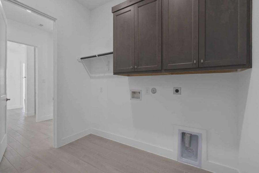 Representative unfurnished interior of a home built from the Waterford by Chesmar Homes in Meridiana 60's, Manvel (Image 23).