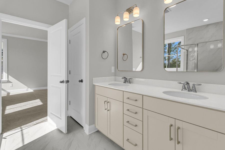 Furnished interior view inside a new home in Tidewater at Lakes of Cane Bay, Summerville (Image 6).