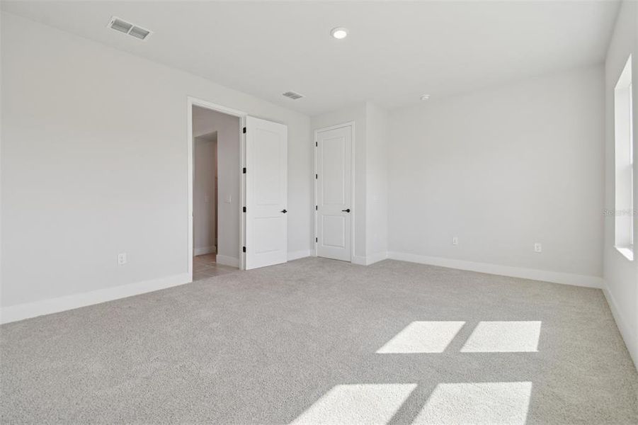 Spacious, unfurnished interior of a new home in Waterset Tradition Series, Apollo Beach (Image 26).