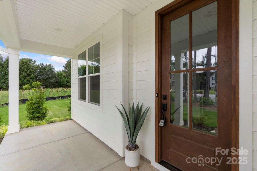 Exterior details and patio area of a home in Crescent Golf, Salisbury (Image 4).