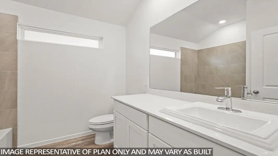 Furnished interior view inside a new home in Sunterra, Katy (Image 9).