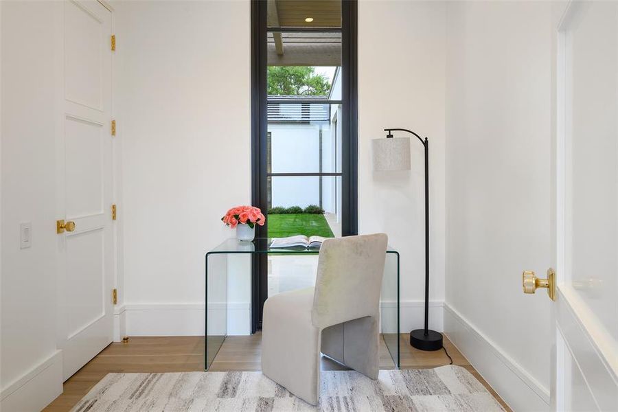 Bathroom with light wood-style floors and baseboards Bathroom with light wood-style floors and baseboards