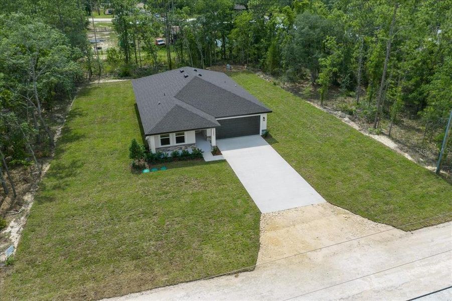 Front exterior of a new home in , Brooksville, FL, highlighting curb appeal (Image 1). Front exterior of a new home in , Brooksville, FL, highlighting curb appeal (Image 1).