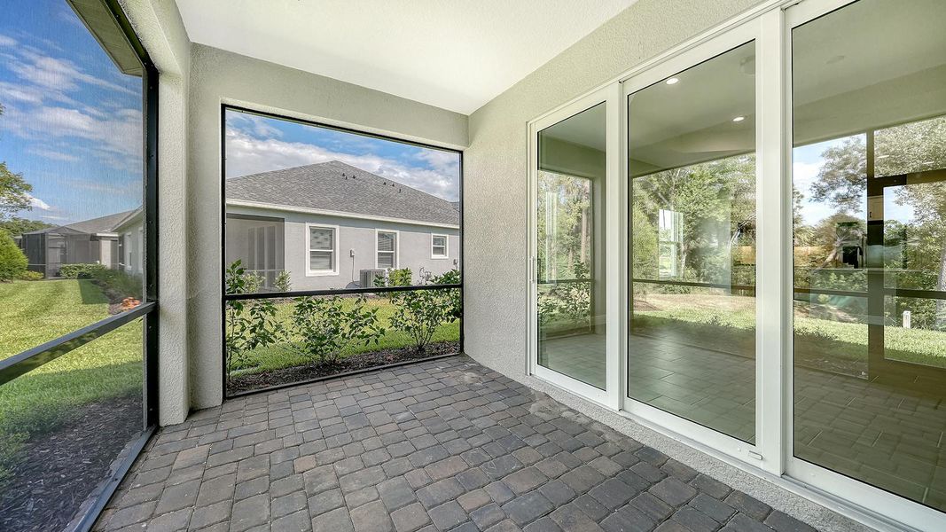 Exterior details and patio area of a home in Wildleaf Real Estate and Homes for Sale in Parrish, FL - Neal Communities, Parrish (Image 4).