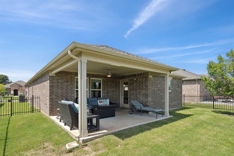 Another view of the patio showing the side of the home.