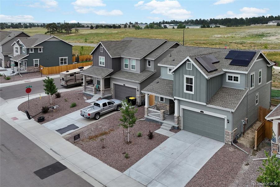Front exterior of a new home in , Elizabeth, CO, highlighting curb appeal (Image 24).