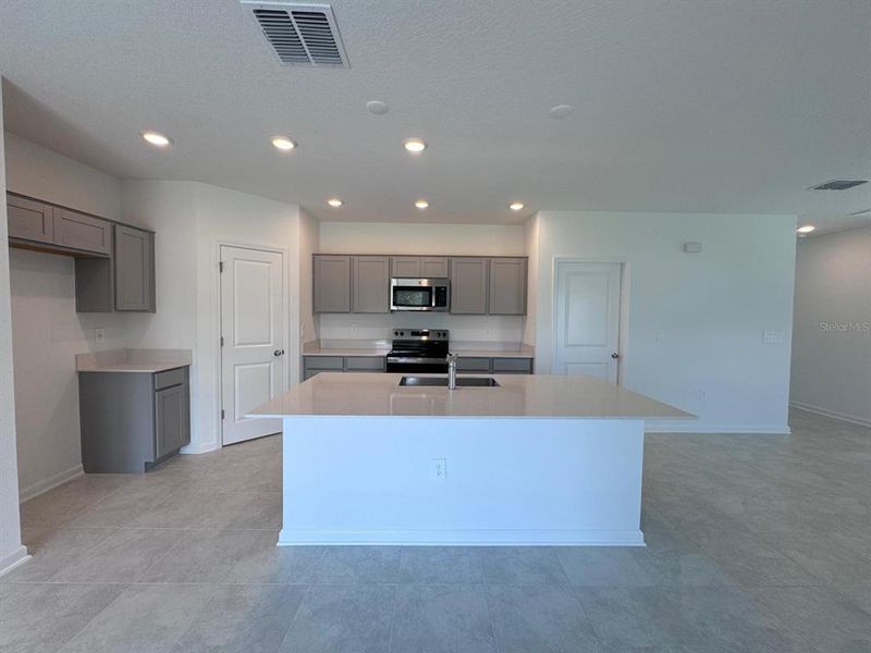 Furnished interior view inside a new home in Cascades, Davenport (Image 7).
